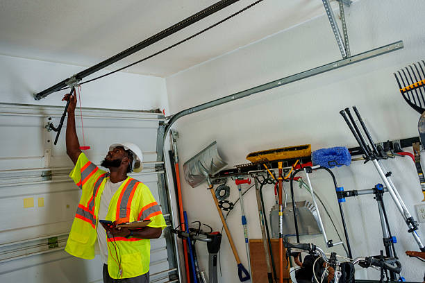 Professional Garage Door Panel Replacement technician working in Bland County County, VA